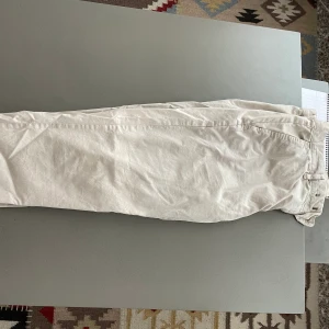 Beiga chinos size M - Chinos som knappt användas 