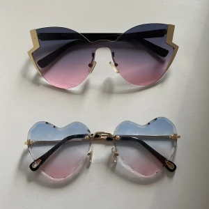 Solglasögon - Säljer 2 par coola solglasögon. Köpte dom i Egypten, men far slutat gilla dom. 