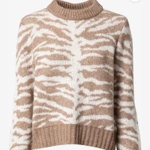 Stickad tröja - Stickad tröja från vila med zebra mönster. Helt oanvänd.