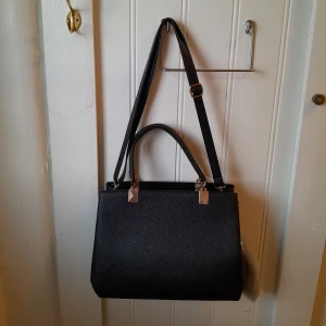 Väska - Fint skick. Postar spårbart 