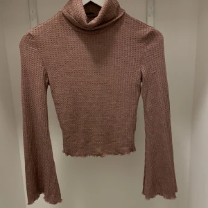 Polo tröja - Fin polotröja med vida armar i storlek xs/s