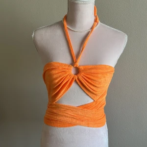 Orange topp - En helt oanvänd orange gullig topp som är ett mjukt tyg och är väldigt fin! 