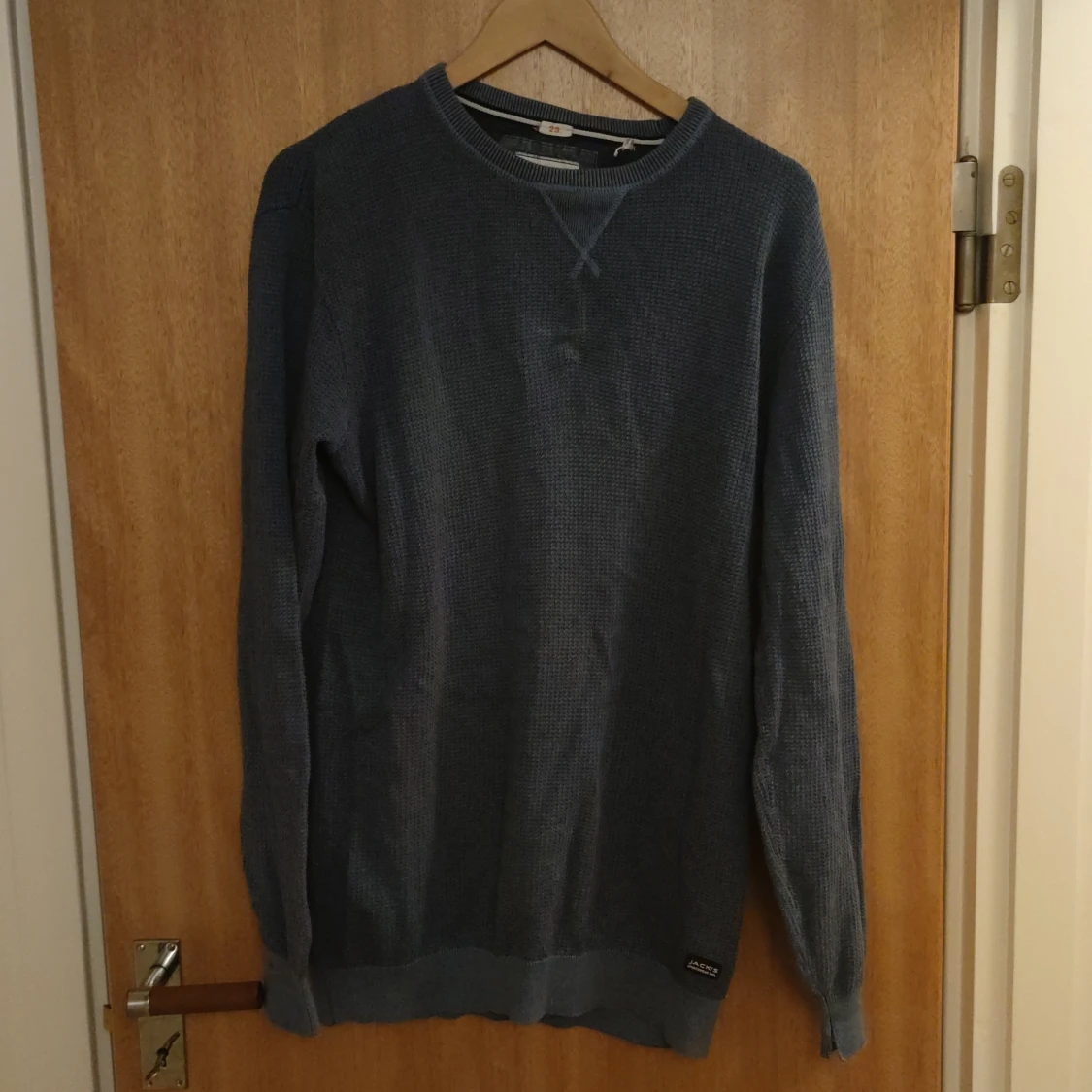 Blå stickad tröja M