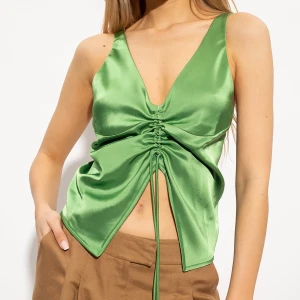 Nanushka Klara top💚 - SKICKA MEDDELANDE INNAN KÖP❗️❗️❗️❗️❗️Nanushka Klara top i grönt💚 strl S. Fint skick, inget att anmärka på. Nypris ca 4000kr, säljer för 1900kr🌟Frakt tillkommer.