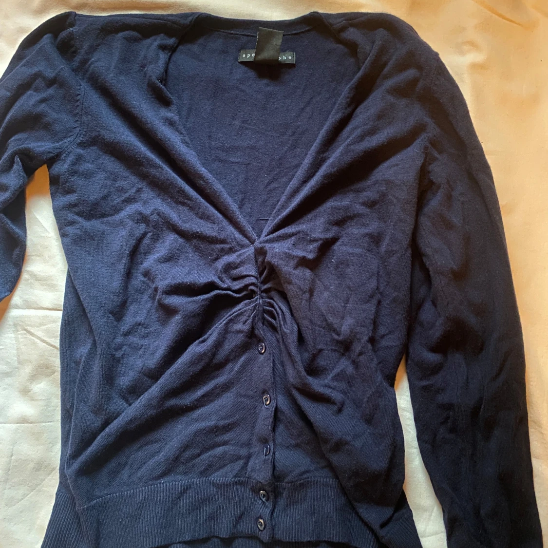 Mörkblå kofta från Apostrophe