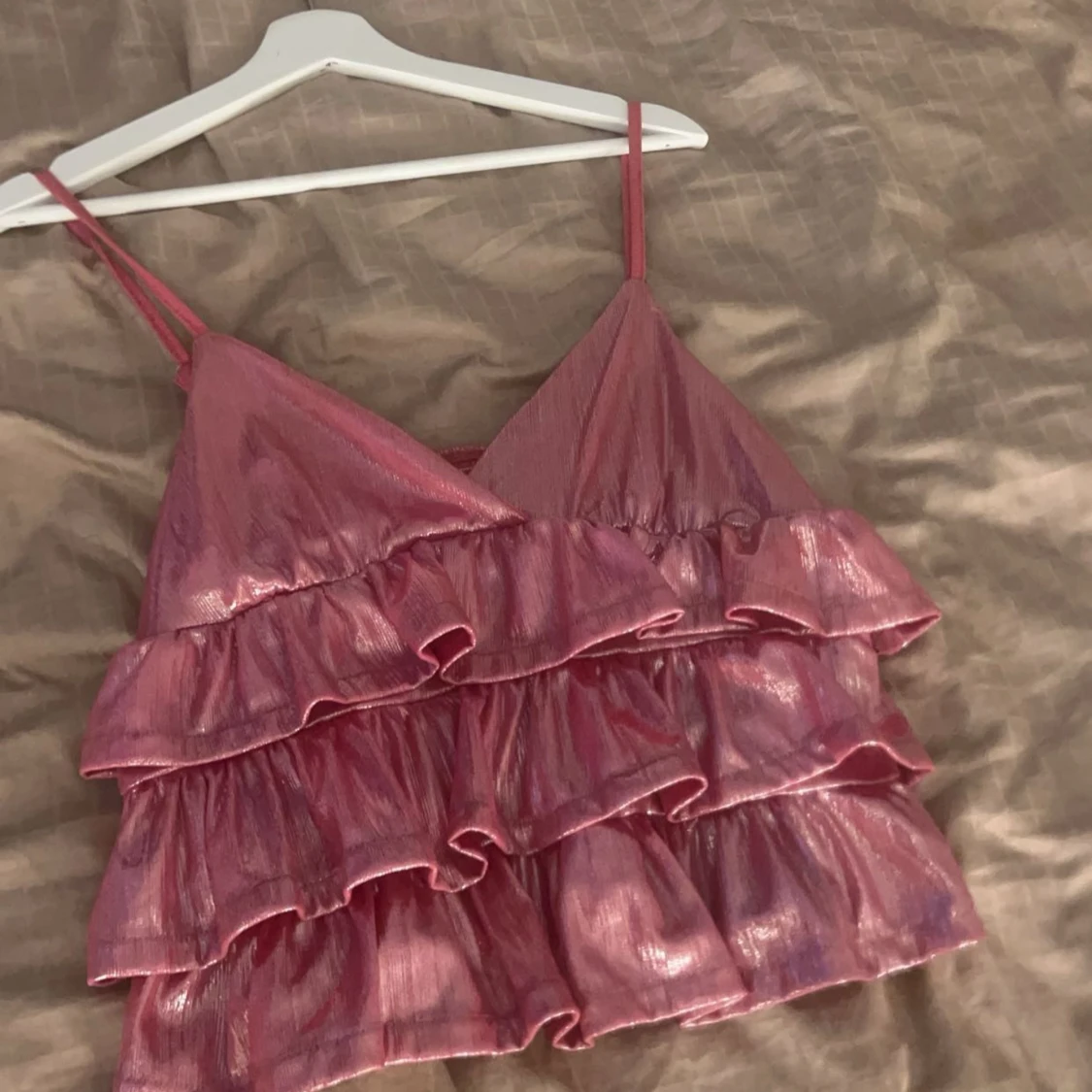 Rosa glittrig volangtopp