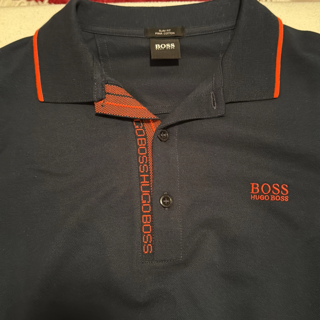 Mörkblå/marinblå pikétröja från Hugo Boss - 92