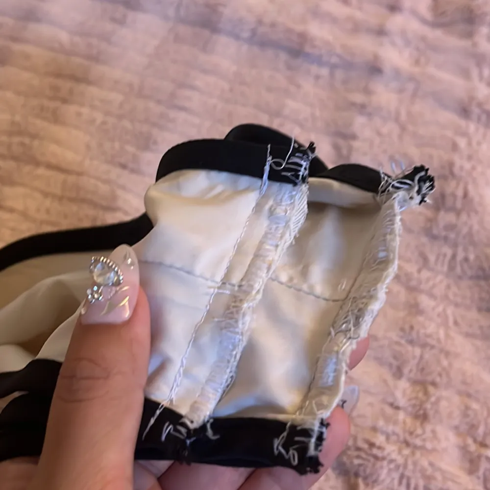 Korset topp. Never used. I sewed in it a bit since it fitted so lose.. Yläosat.