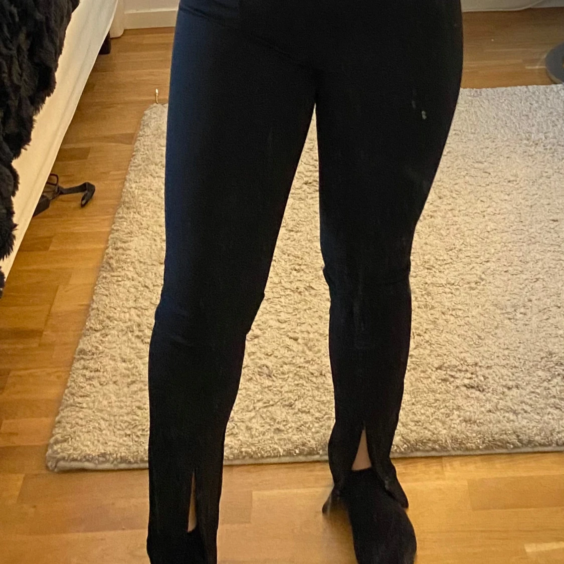 Svarta byxor med slits - 1