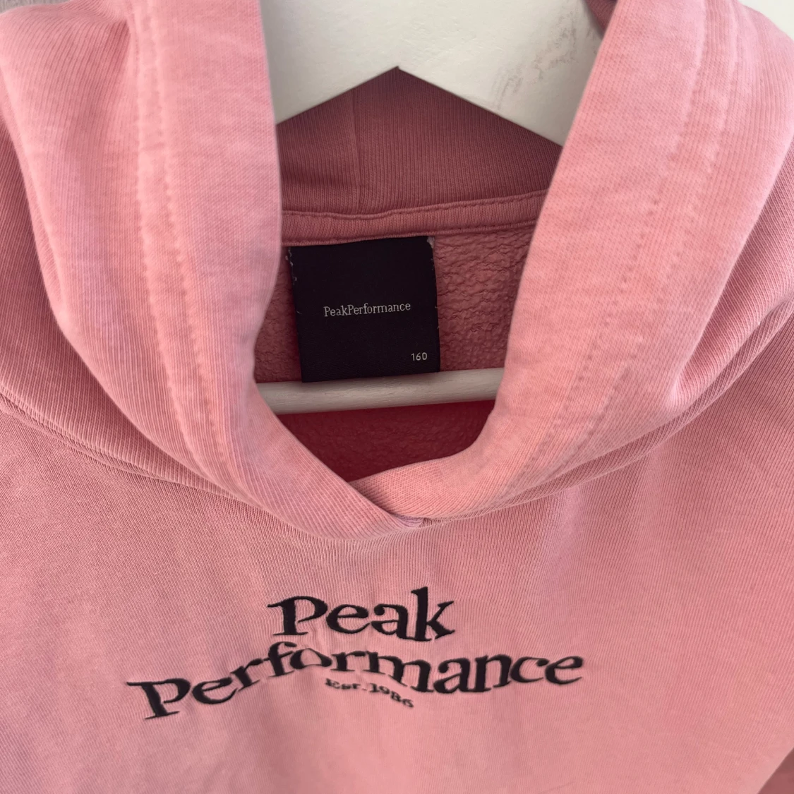Rosa hoodie från Peak Performance - 1