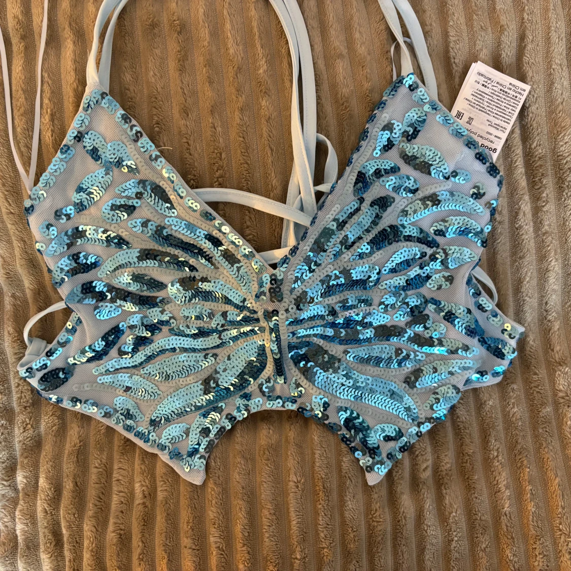 Blå paljettprydd topp