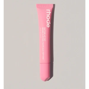 Peptide Lip Tint från Rhode - En rosa Peptide Lip Tint från Rhode. Denna läpprodukt kommer i en praktisk tub och är designad för att ge en subtil färg och återfuktning till läpparna. Oöppnad