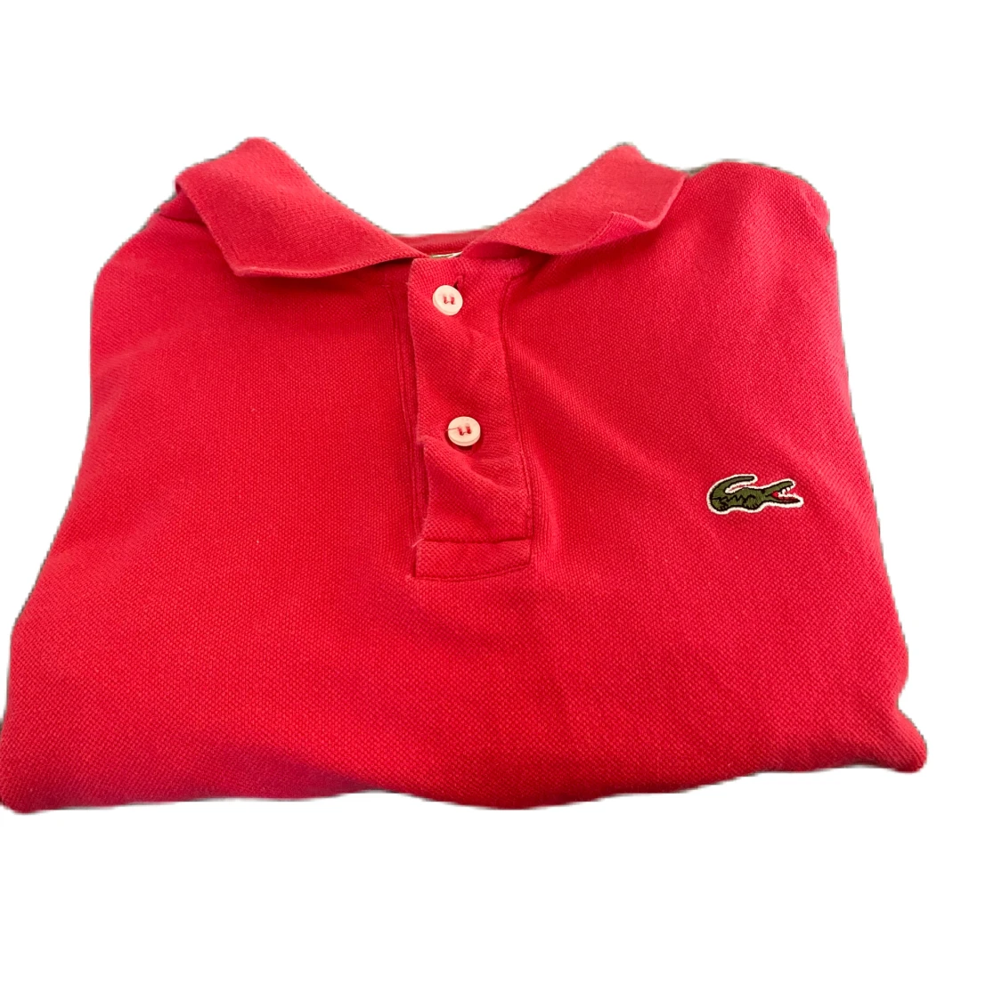 Röd pikétröja från Lacoste