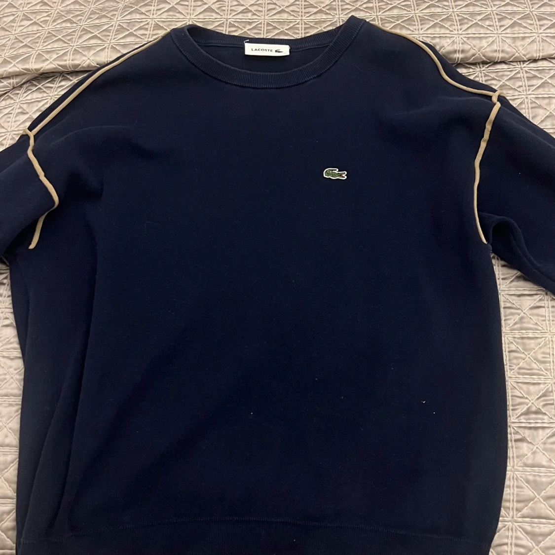 Mörkblå tröja från Lacoste - 1