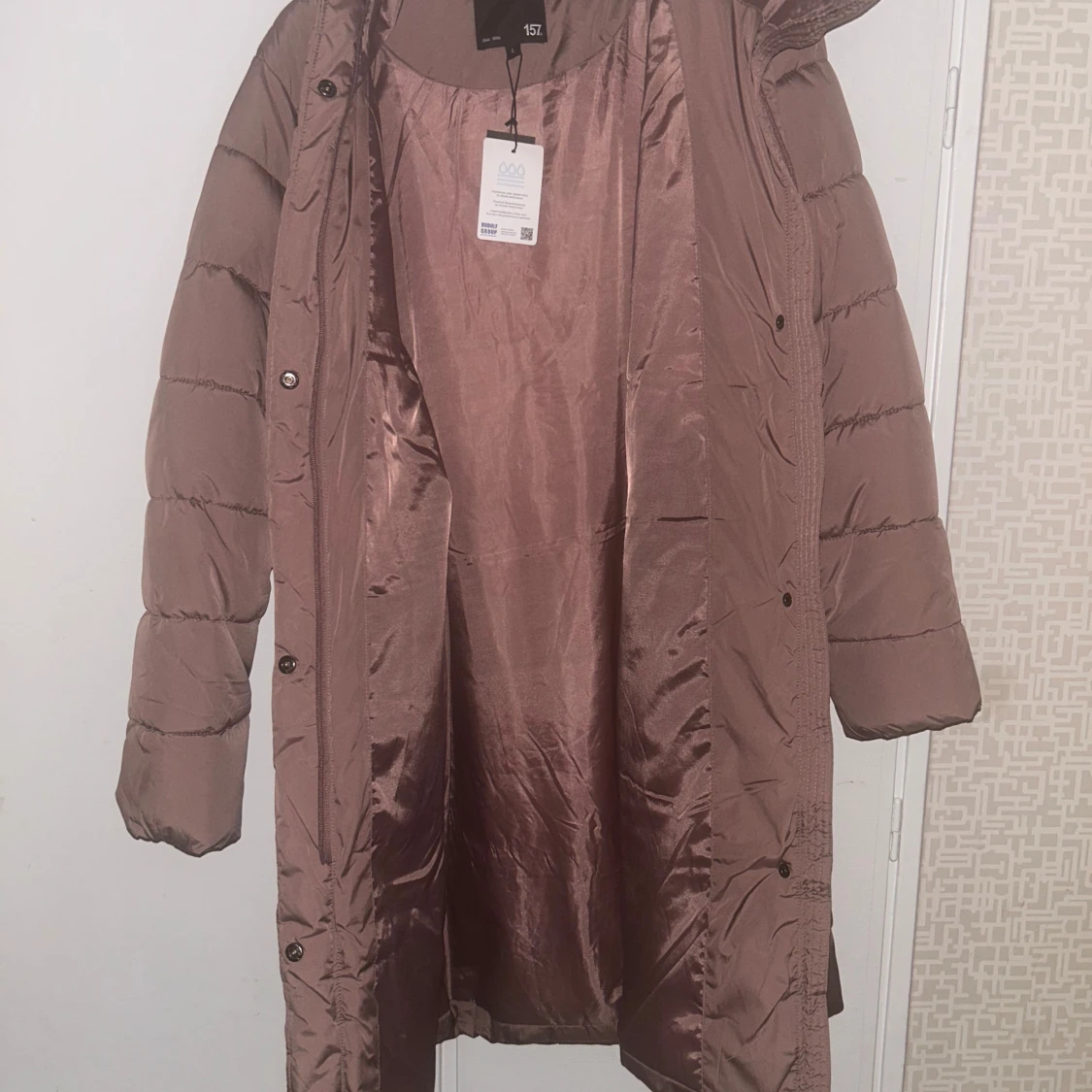 Gris Rosa lång pufferjacka från Vero Moda