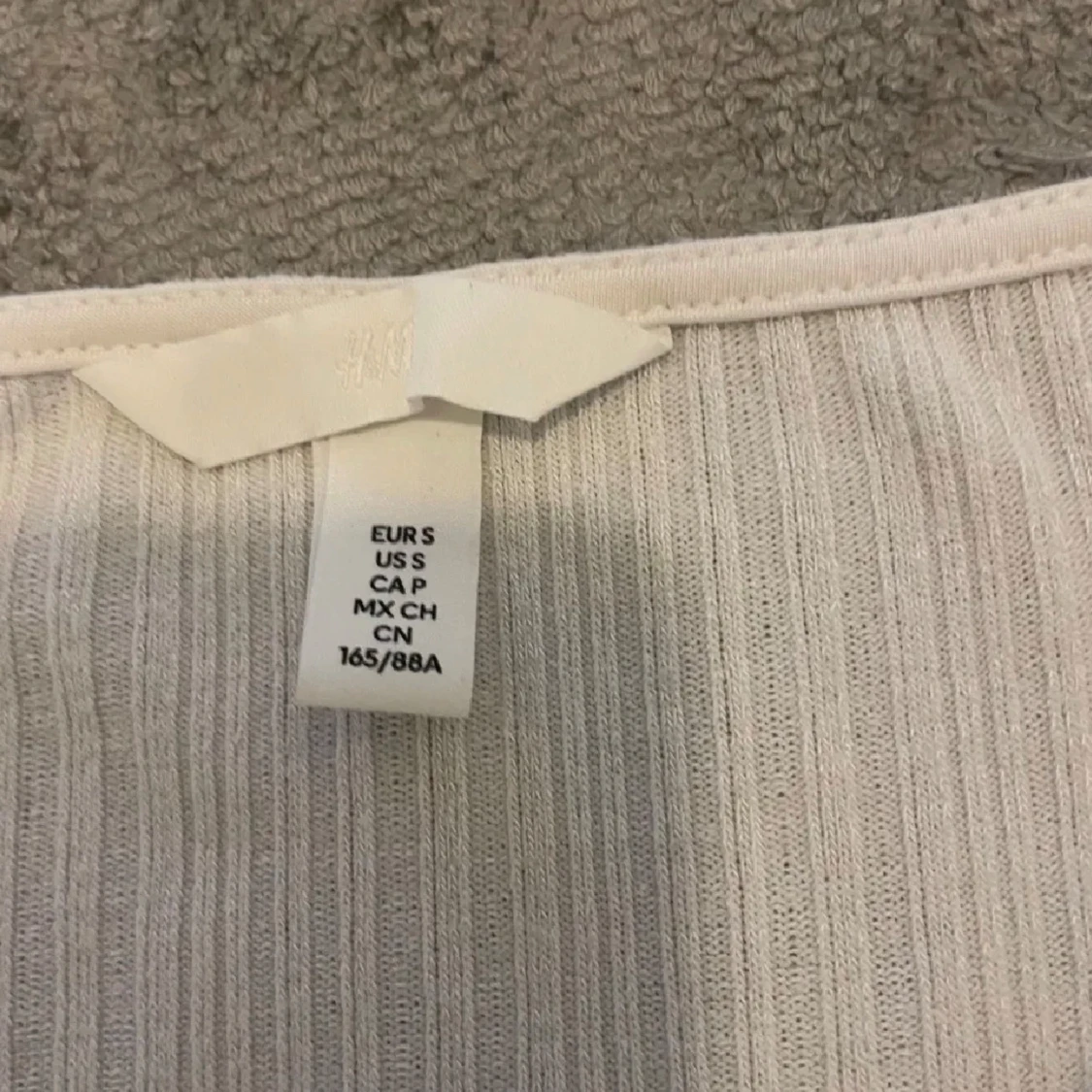 Vit ribbad topp från H&M - 90