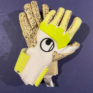Uhlsport målvaktshandskar - Snygga målvaktshandskar i gult och vitt i storlek 8, använda fåtal gånger