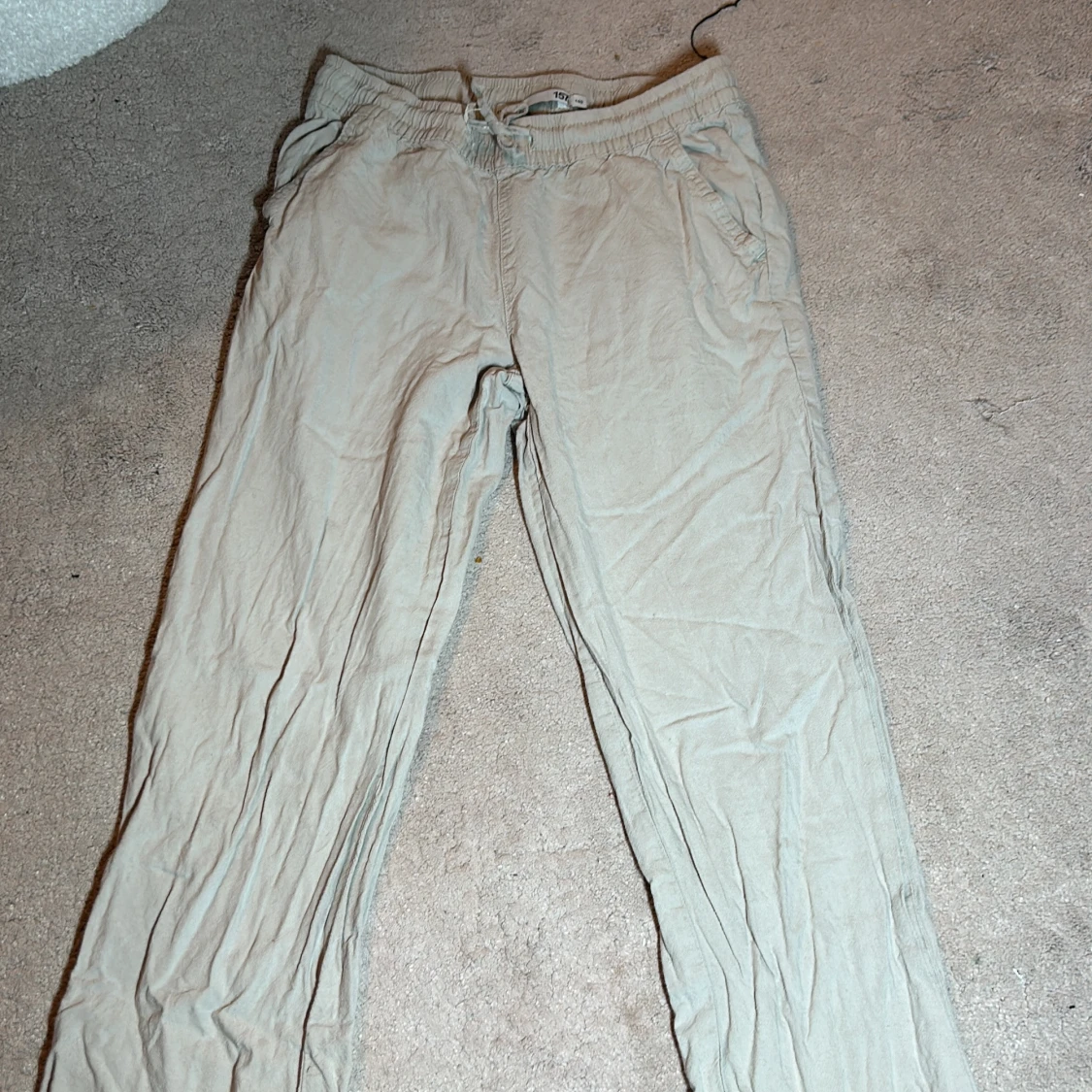 Beige byxor från 157