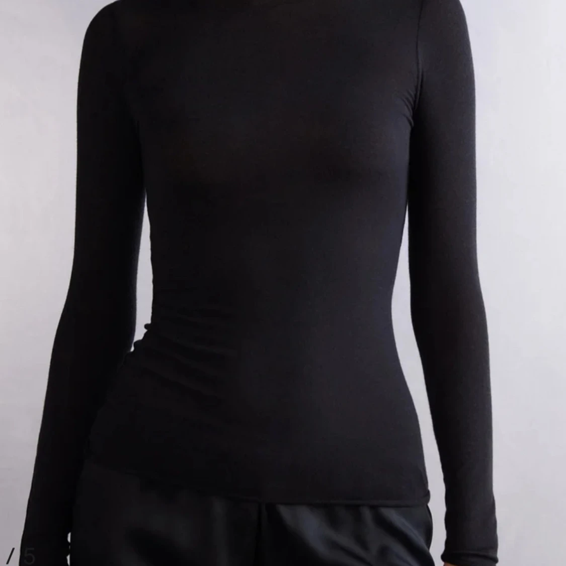 En svart intimissmi  - 90