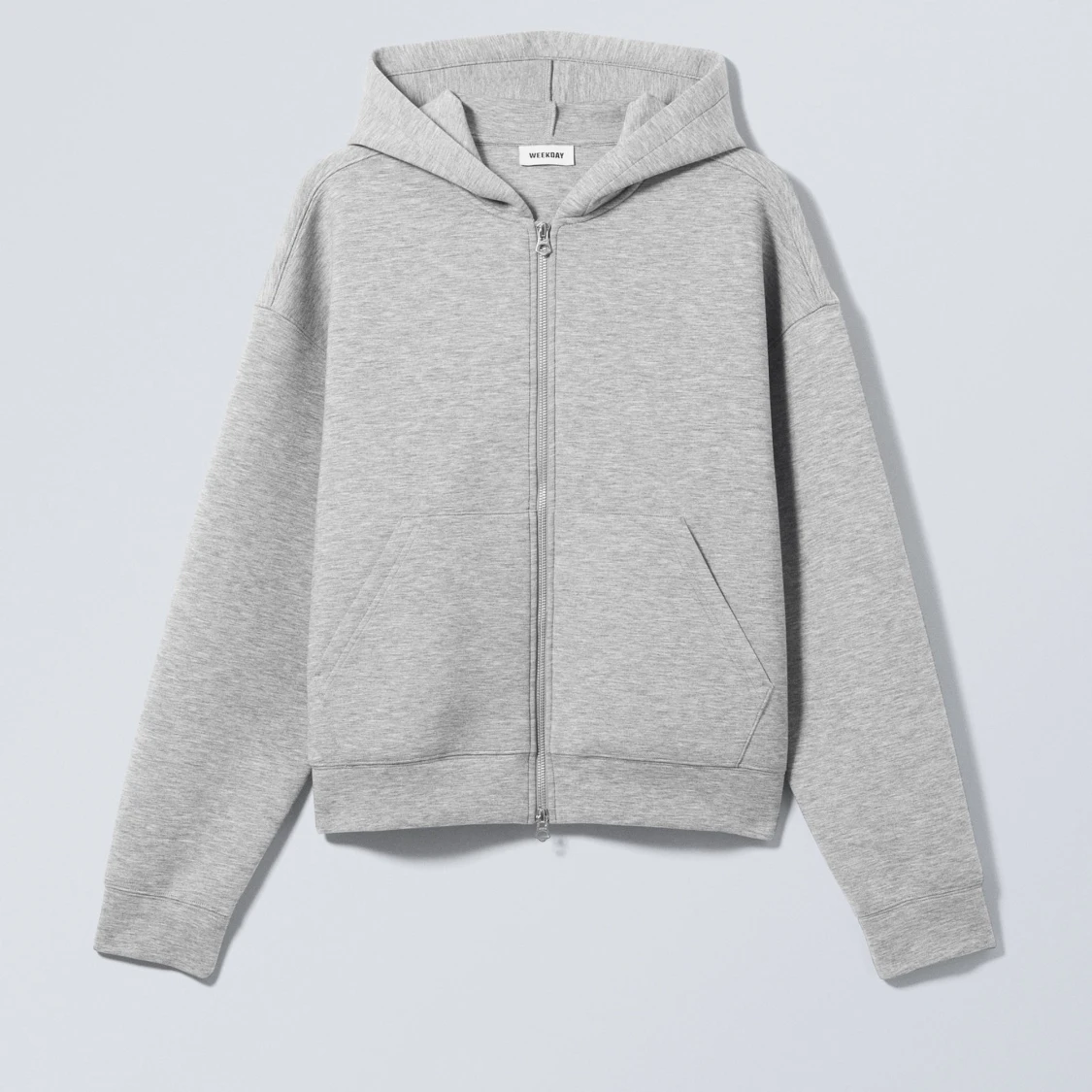 Grå hoodie med dragkedja från Weekday