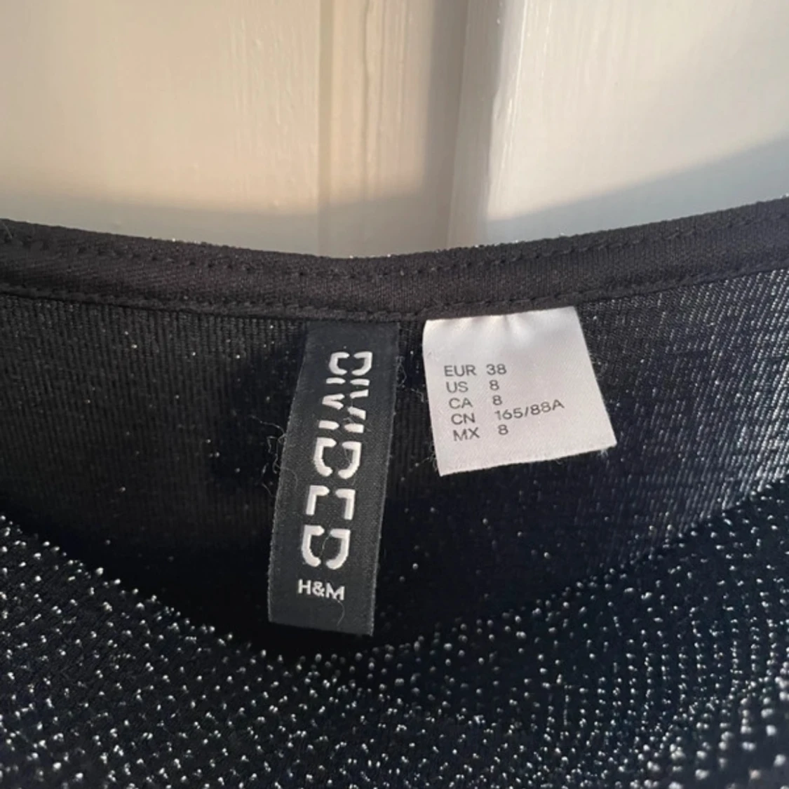 Svart glittrig klänning från H&M Divided - 90