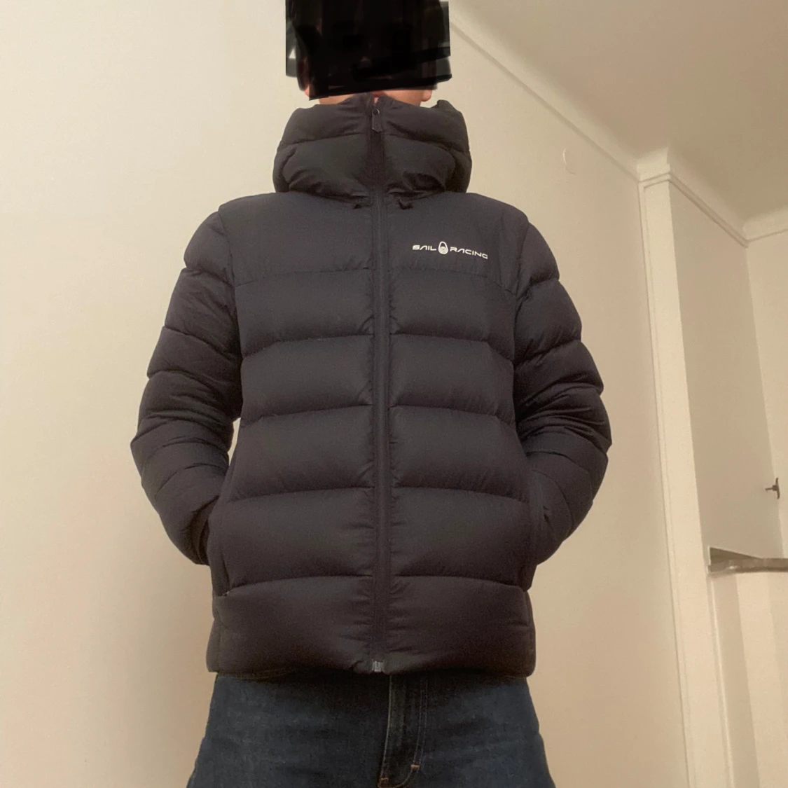 Mörkblå dunjacka från Sail Racing