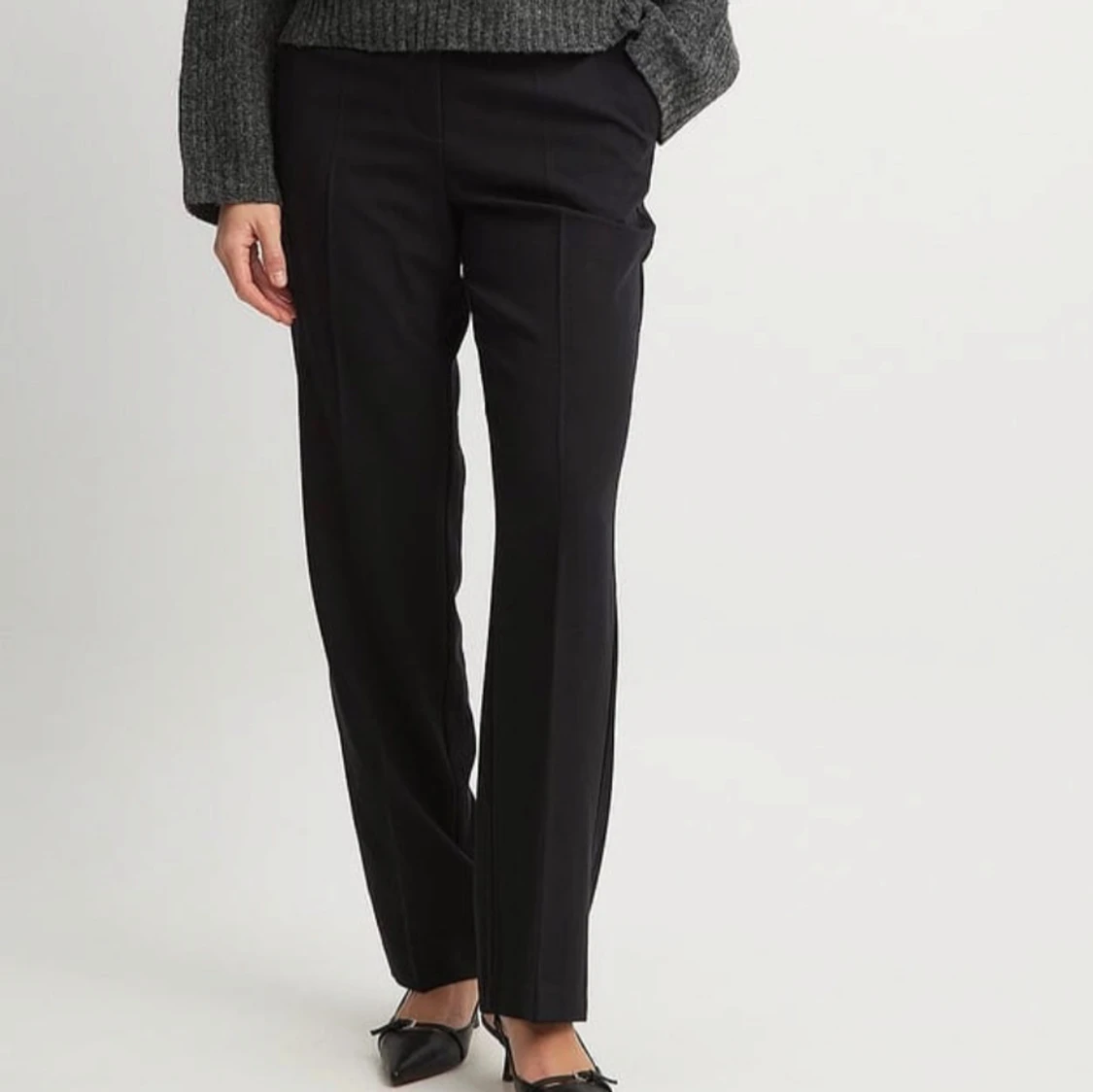 Svarta kostymbyxor
