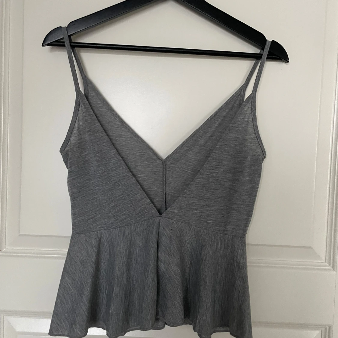 Grå ärmlös topp - 90