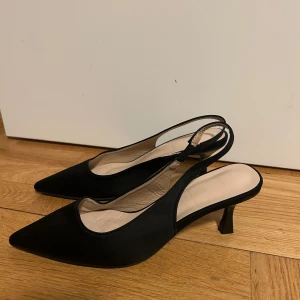 Svarta pumps  - Bra skick. Storlek 38