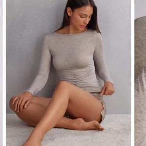 Beige långärmad intimissimi topp - Säljer en stilren beige/lila/rosa (färgen är tydlig på bilderna) långärmad topp från intimissimi i mjukt material. Perfekt för både vardag och festliga tillfällen. Använd minst 2 gånger och har inga diefekter! Original pris 459kr.