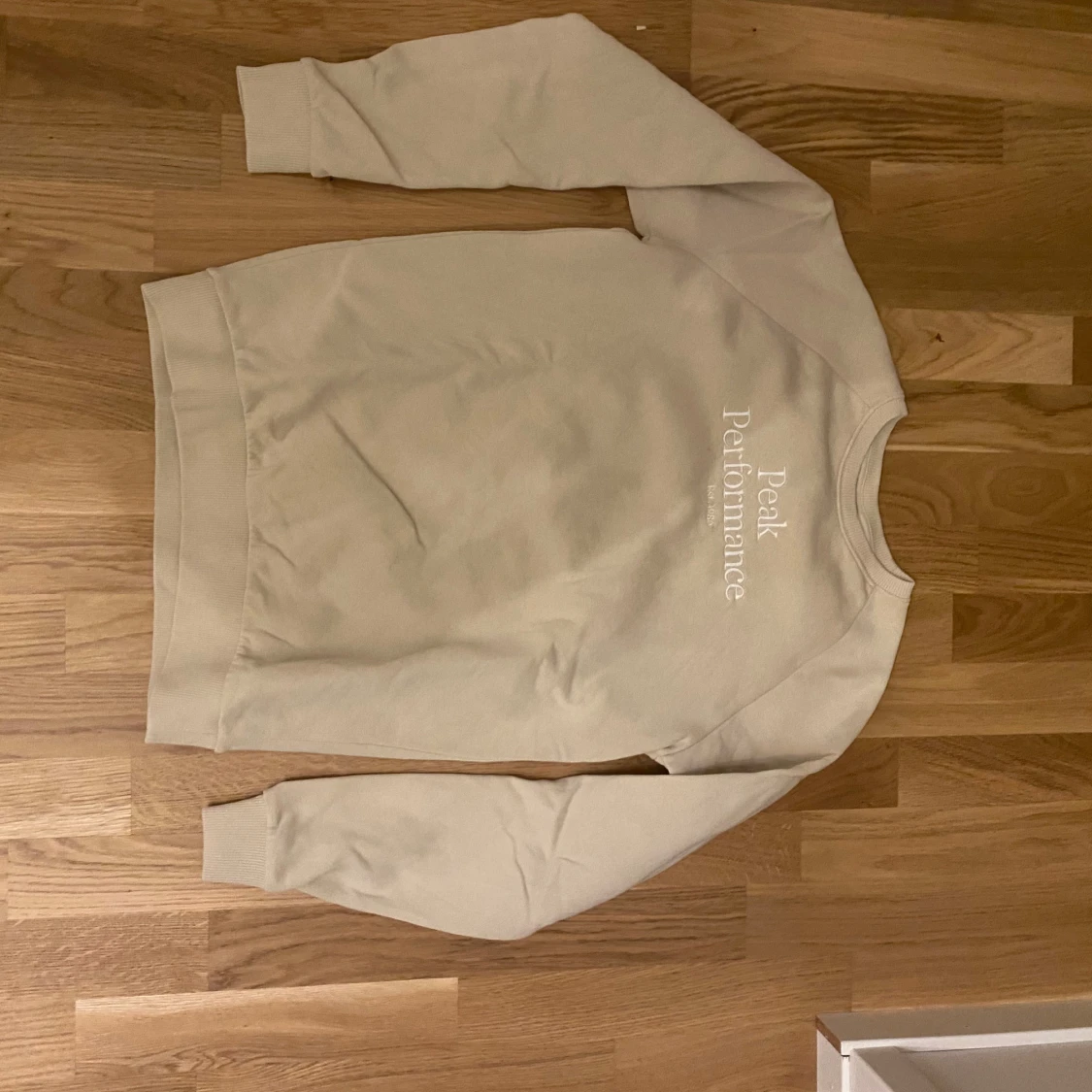 Beige tröja från Peak Performance
