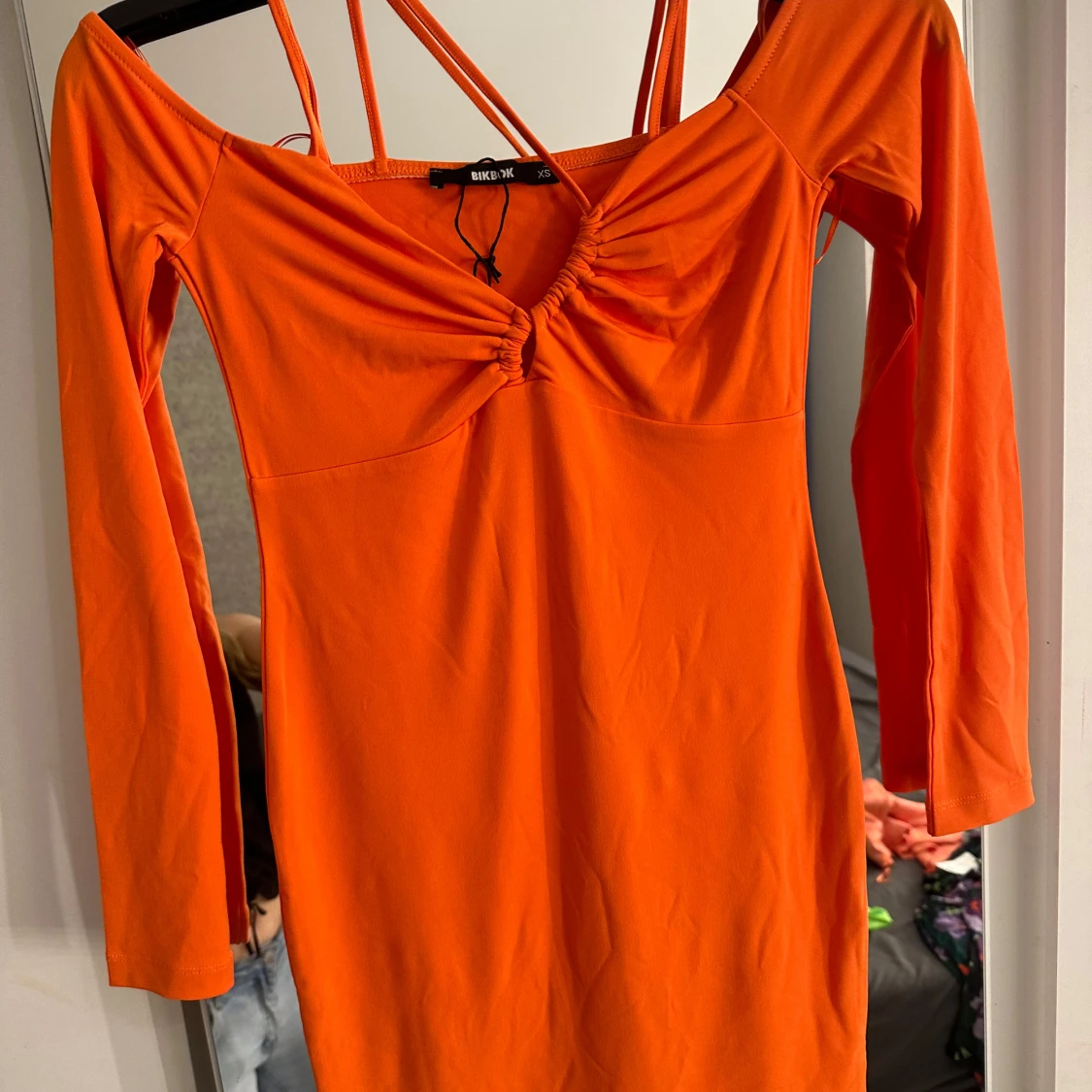 Orange klänning från DK London