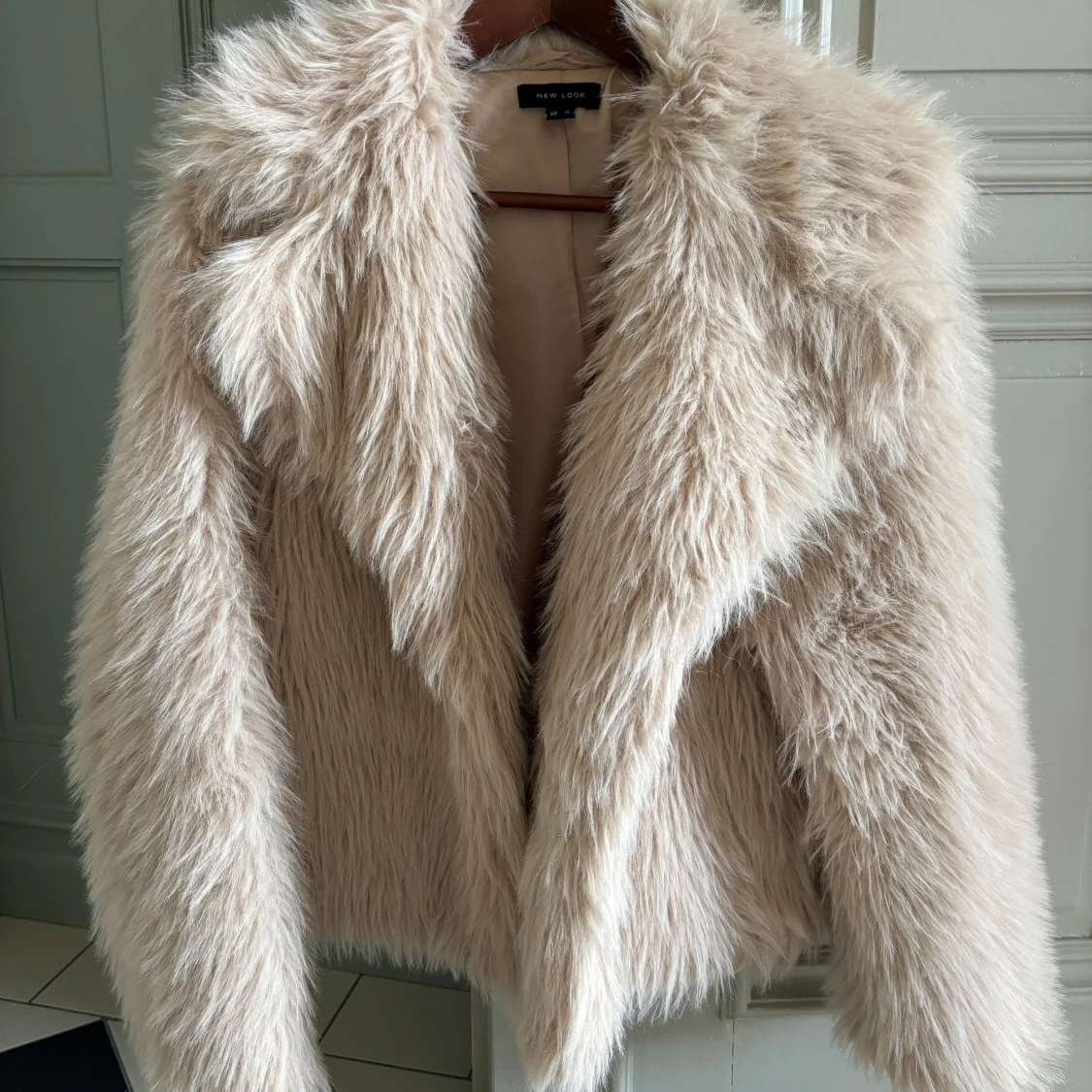 Beige pälsjacka New look