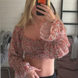 Blommig blus - Använd en gång