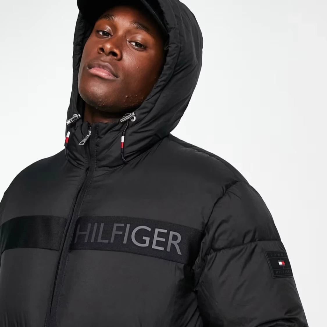 Tommy Hilfiger NY high loft hooded puffer jacket in black - 90