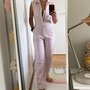 Levis jumpsuit  - Pink levis jumpsuit  Uesd but in good condition  Size xs