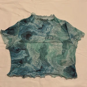 Meshtop från Nelly - Jättesnygg meshtop från Nelly. Passar perfekt till fest, super snygg färg 