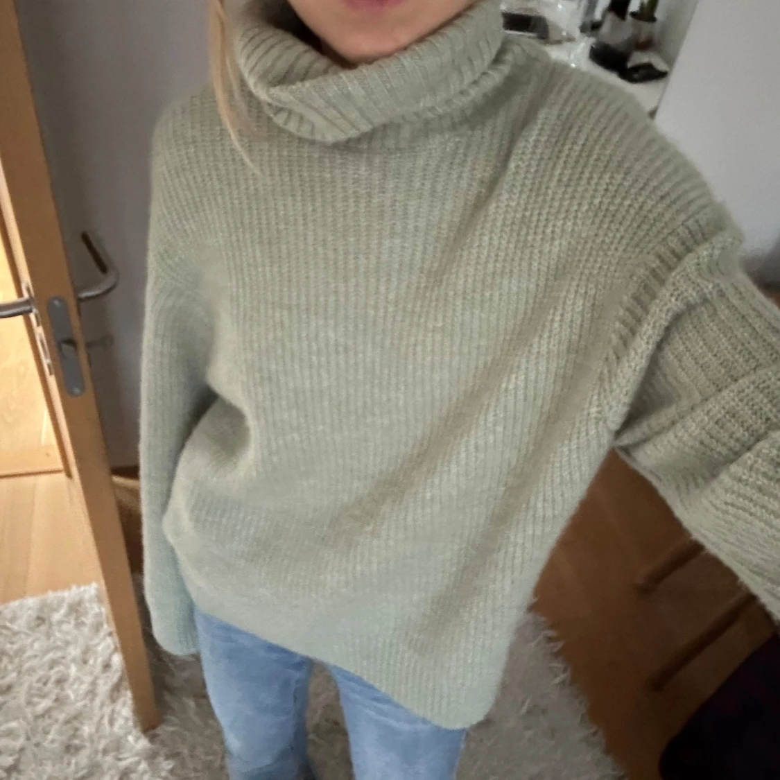 Grön stickad polotröja