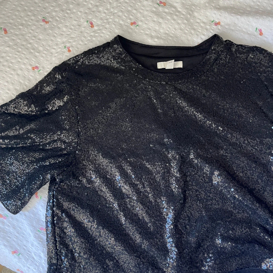 Svart glittrig topp - 1