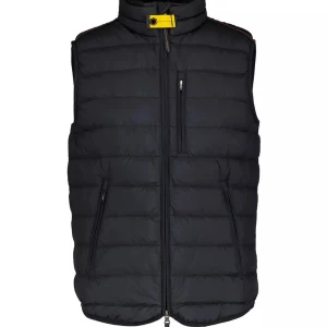 Svart dunväst med dragkedja - Snygg svart dunväst med dragkedja och hög krage. Västen har praktiska fickor med dragkedjor och en gul detalj vid halsen. Perfekt för kyligare dagar.