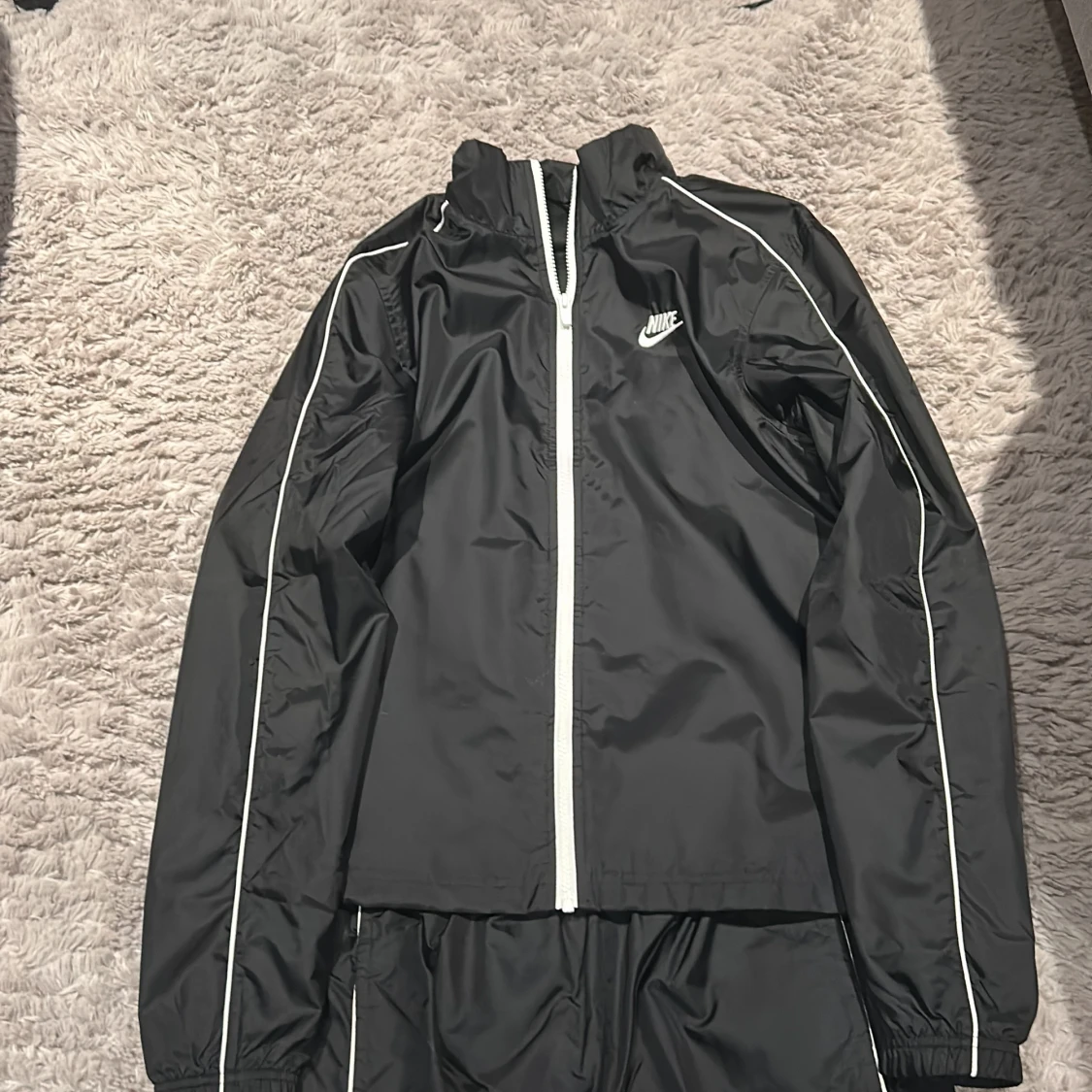 Ett set med nike träningskläder  - 90