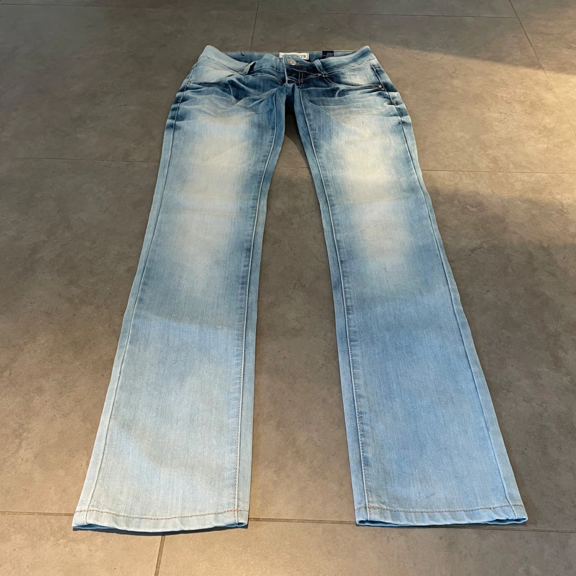 Ljusblå Lågmidjade jeans med bootcut