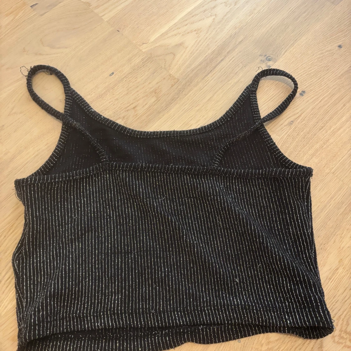 Svart glittrig linne - 1