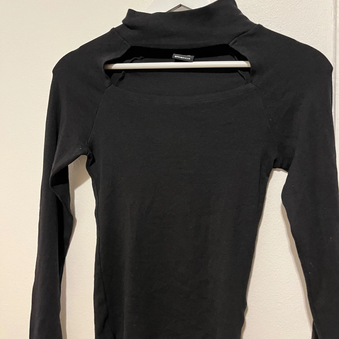Svart långärmad tröjs