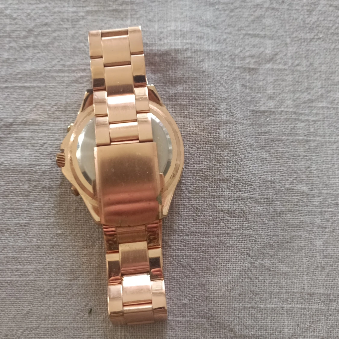 Guldfärgad klocka - 90