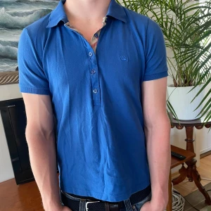 burberry pike - burberry piké storlek L (Passar S)