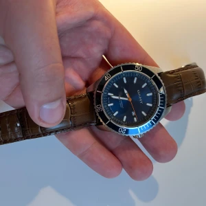 Gant klocka - Gant klocka. Fint skick. Full set. Har även en fiber strap som ingår i blått.
