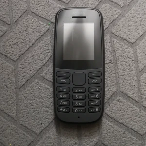 Mini telefon  - Vet inte om den funkar 