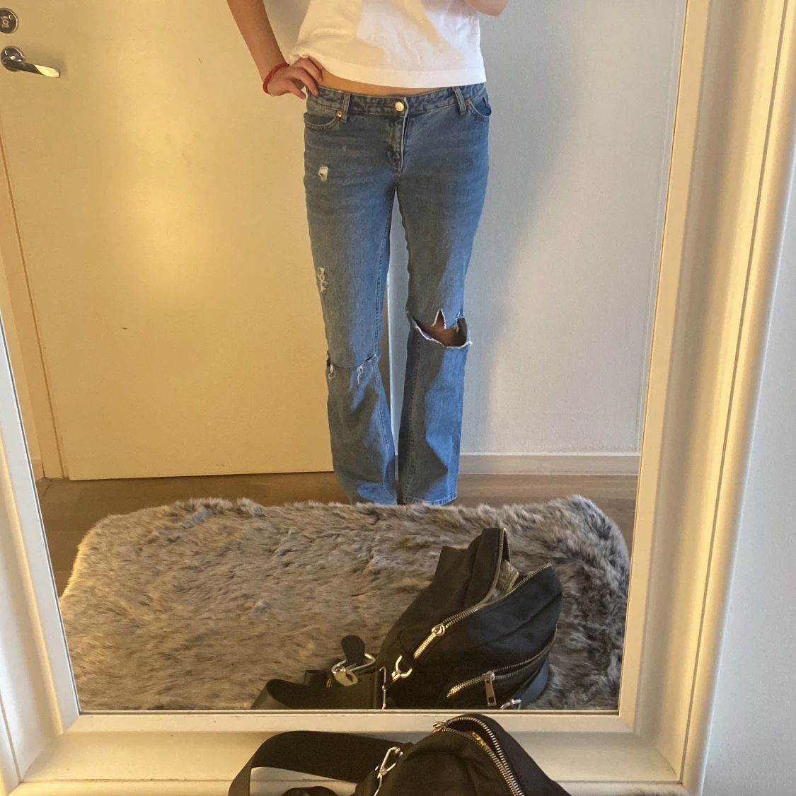 Blåa bootcutjeans - 90