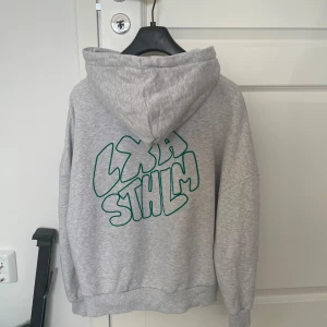 Grå hoodie från LXA the label  - Knappt använd 